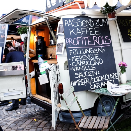 {My kind of food truck! Profiteroles with assorted fillings and sauces on offer.}