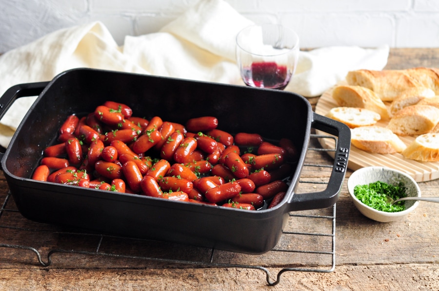 honey soy sriracha cocktail sausages in baking dish