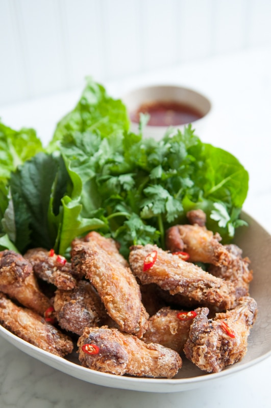 crispy chicken wings with fish sauce with sliced chillies