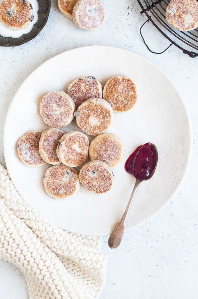plate of welsh cakes with spoonful of strawberry jam