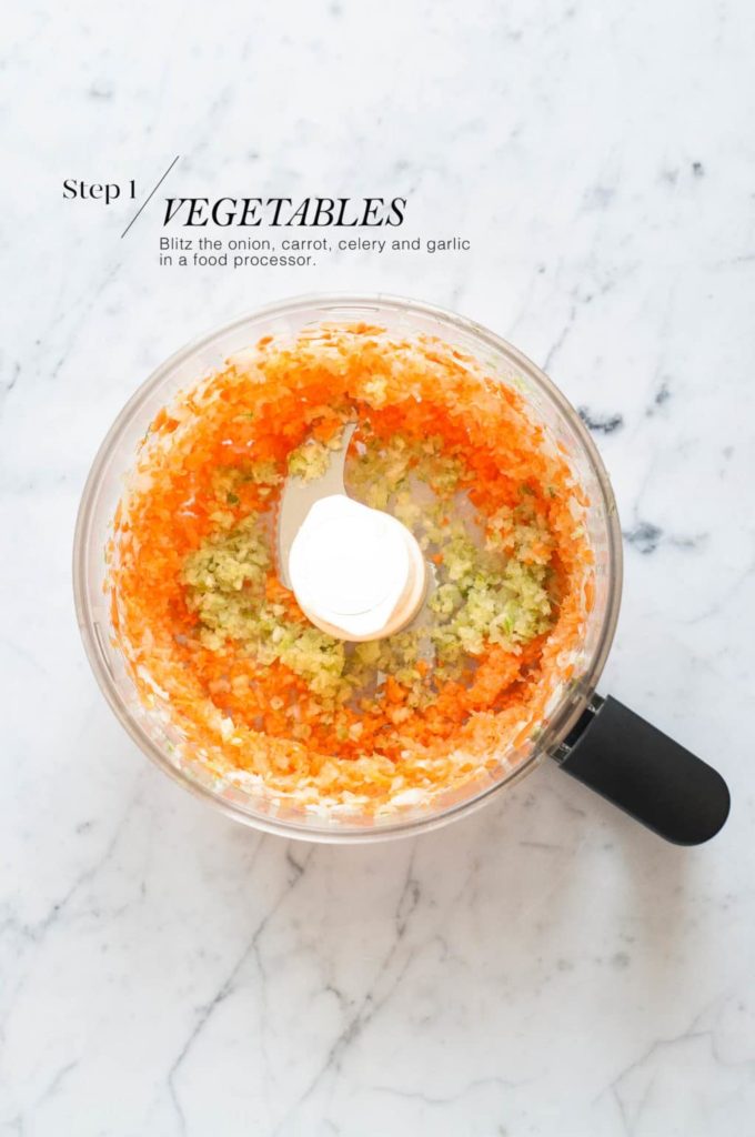 how to make spaghetti bolognese - finely chopped vegetables in food processor bowl