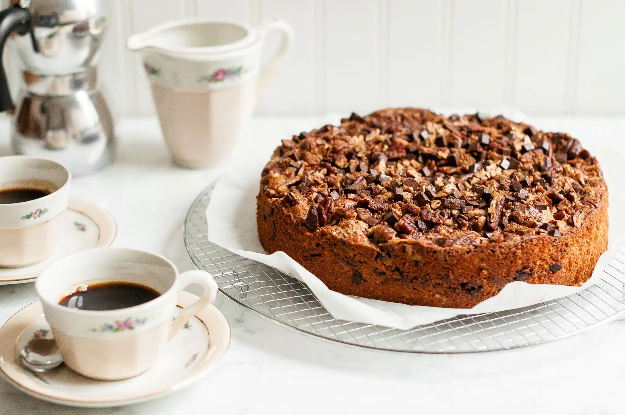 chocolate pecan coffee cake with coffee cups