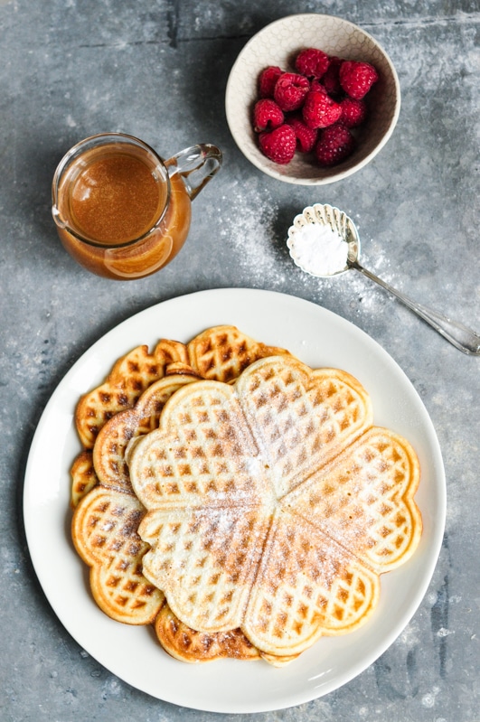 Waffles with Salted Caramel Sauce with bowl of raspberries