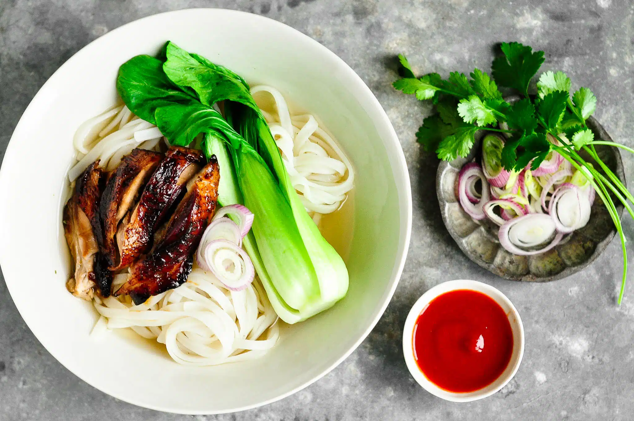 sticky chicken pho with herbs