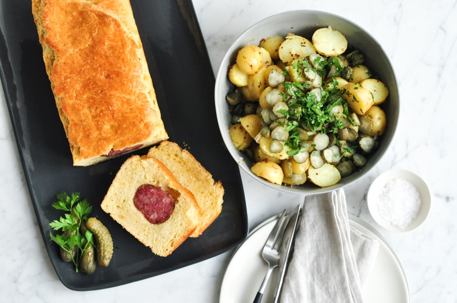 lyonnaise sausage roll with potato salad