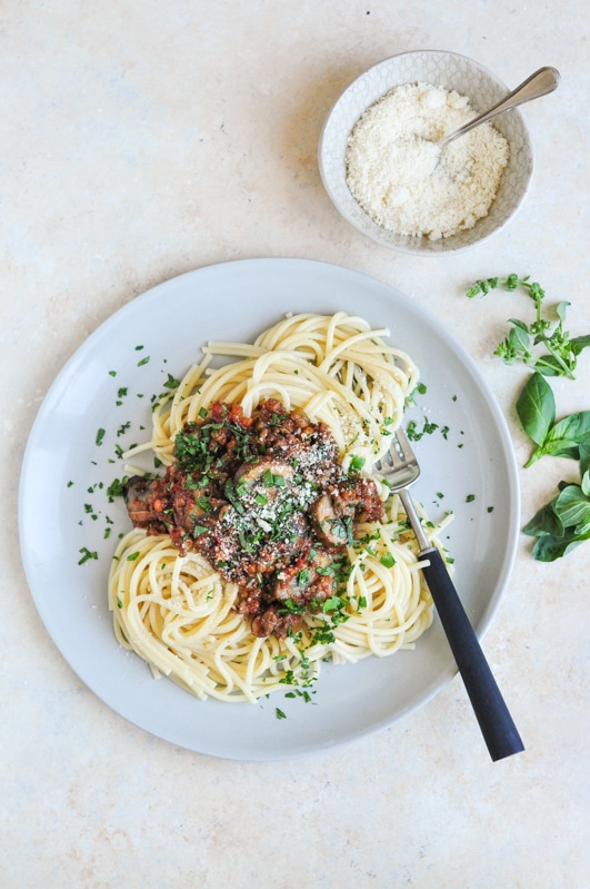 vietnamese spaghetti bolognese with bowl of cheese