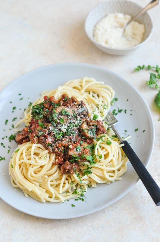 vietnamese spaghetti bolognese on plate with fork