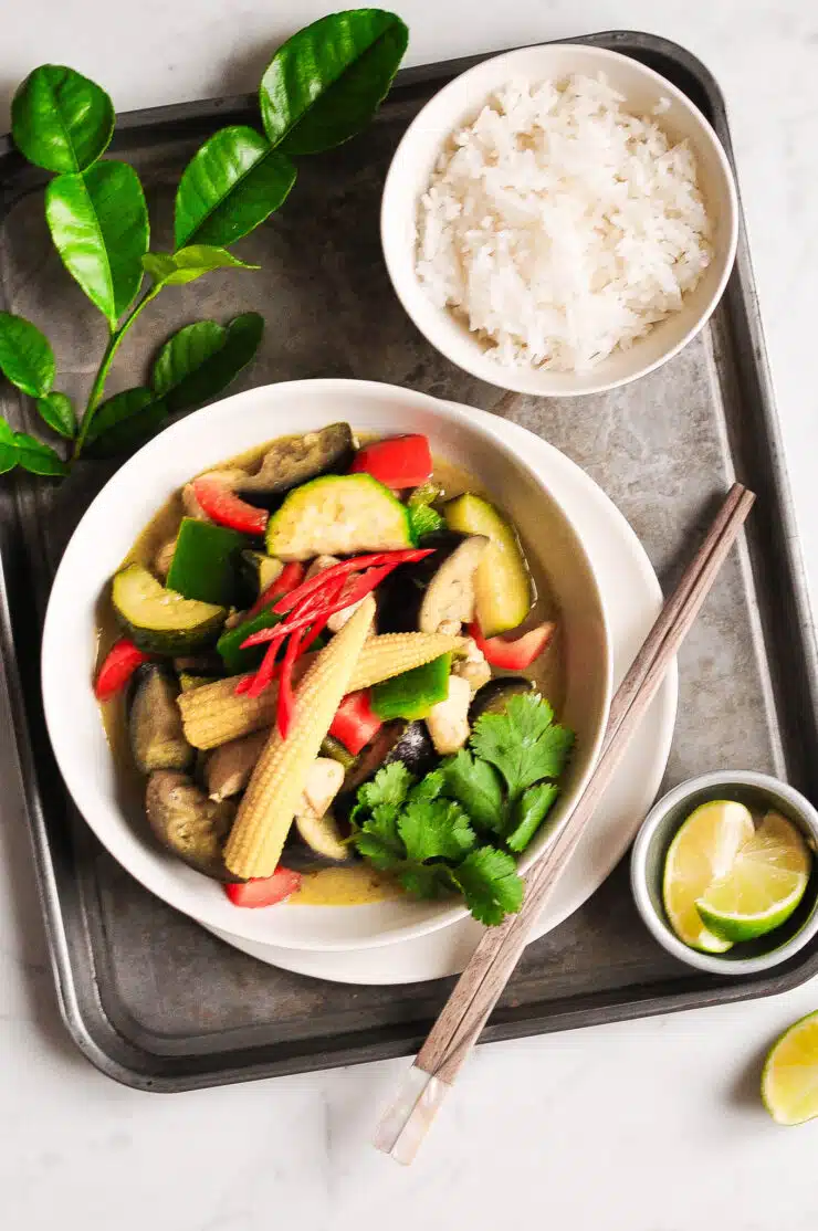 thai green curry with vegetables in bowl with rice