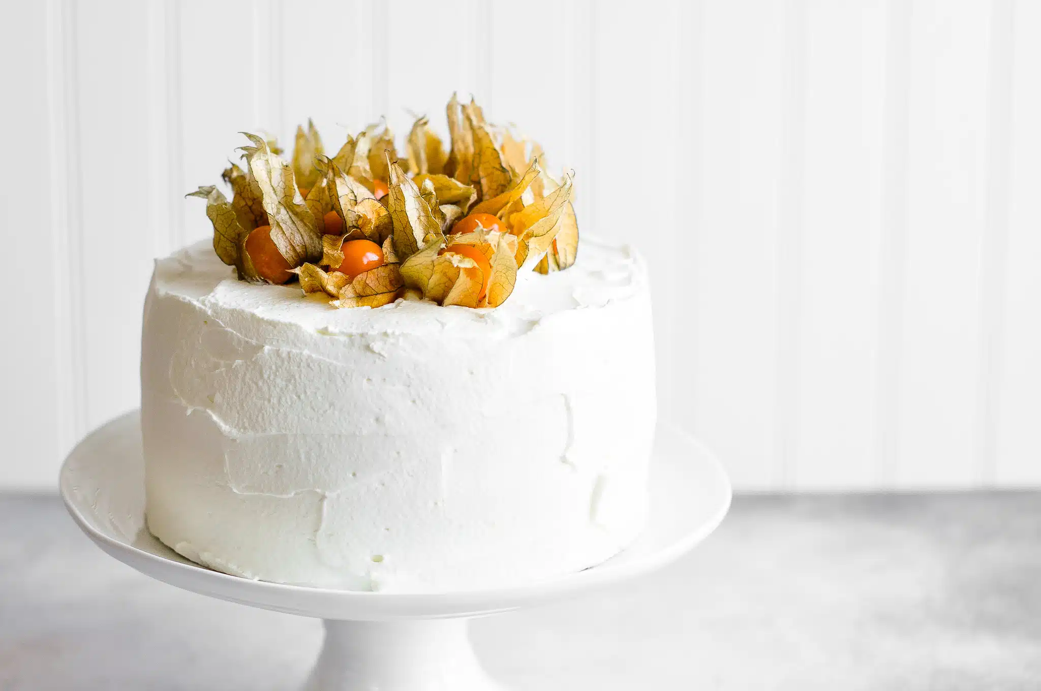 vanilla sponge cake on cake stand