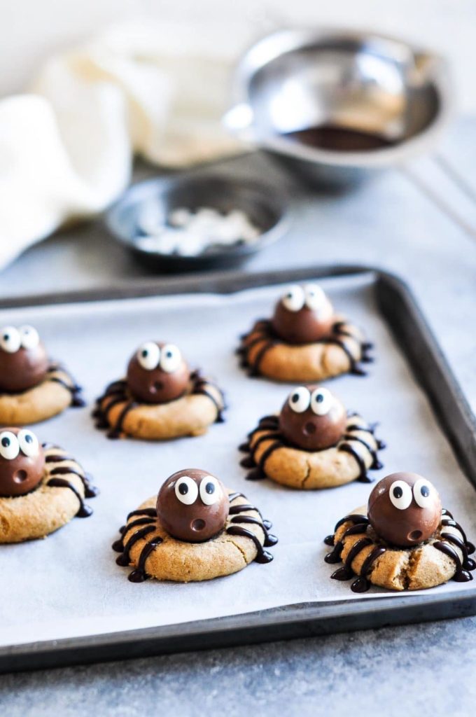 peanut butter spider cookies on baking tray