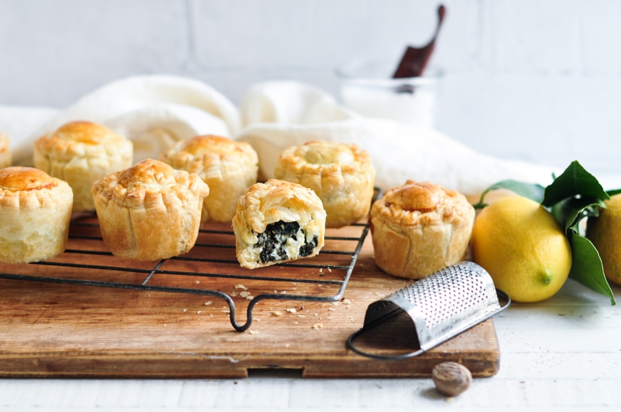 mini spinach and feta pies on wire rack
