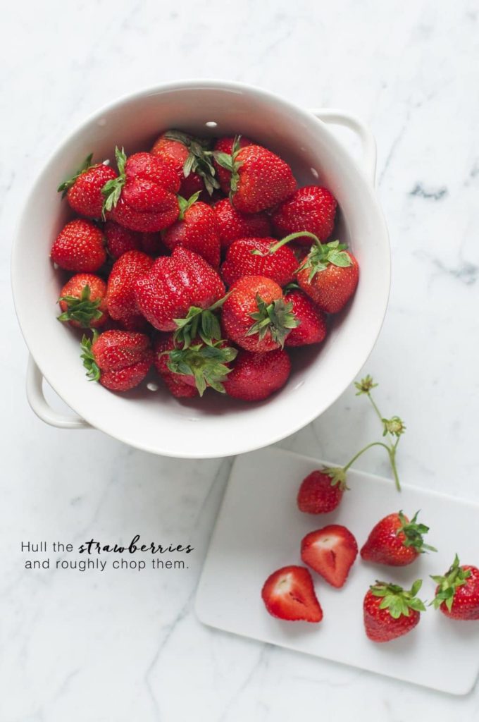 how to make strawberry jam, hull and chop the strawberries