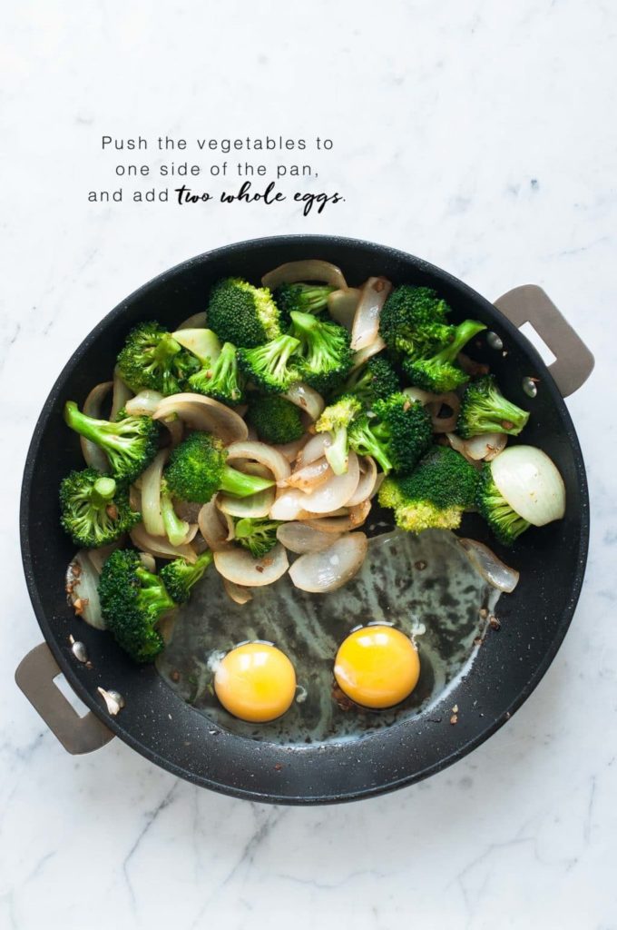 how to make pad see ew, non-stick pan with vegetables and two whole eggs added