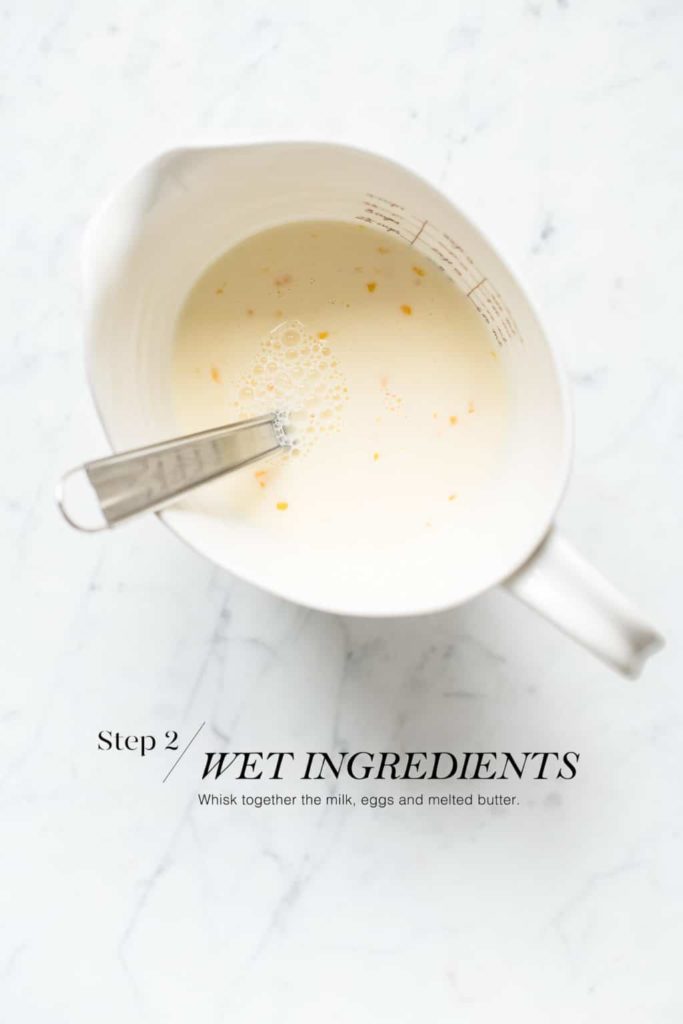 wet pancake ingredients in white measuring jug