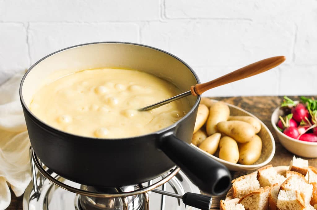 cheese fondue with boiled potatoes