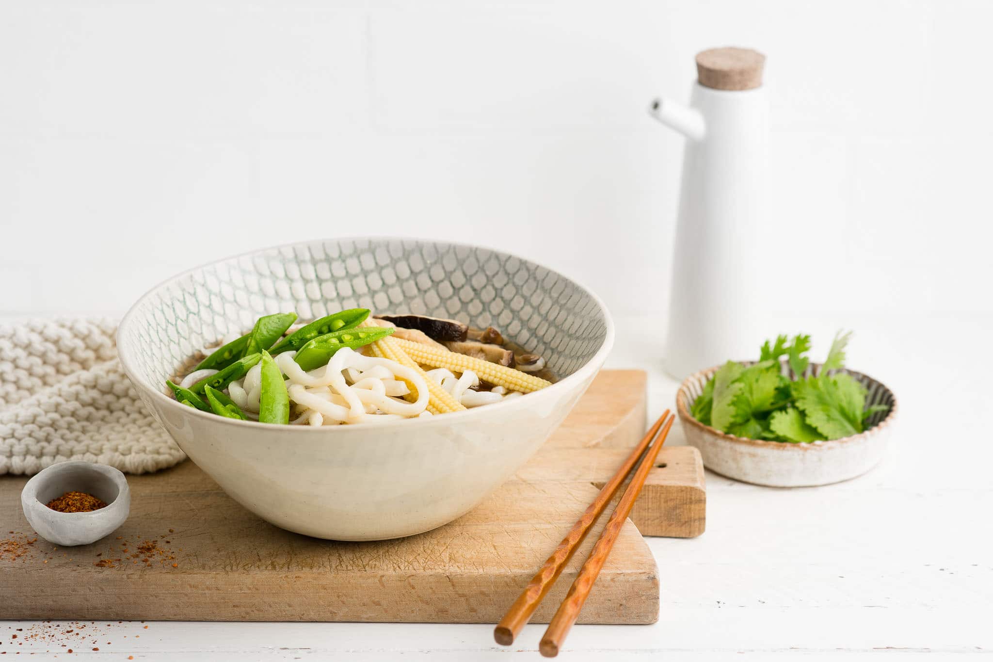 udon noodle soup on wooden board