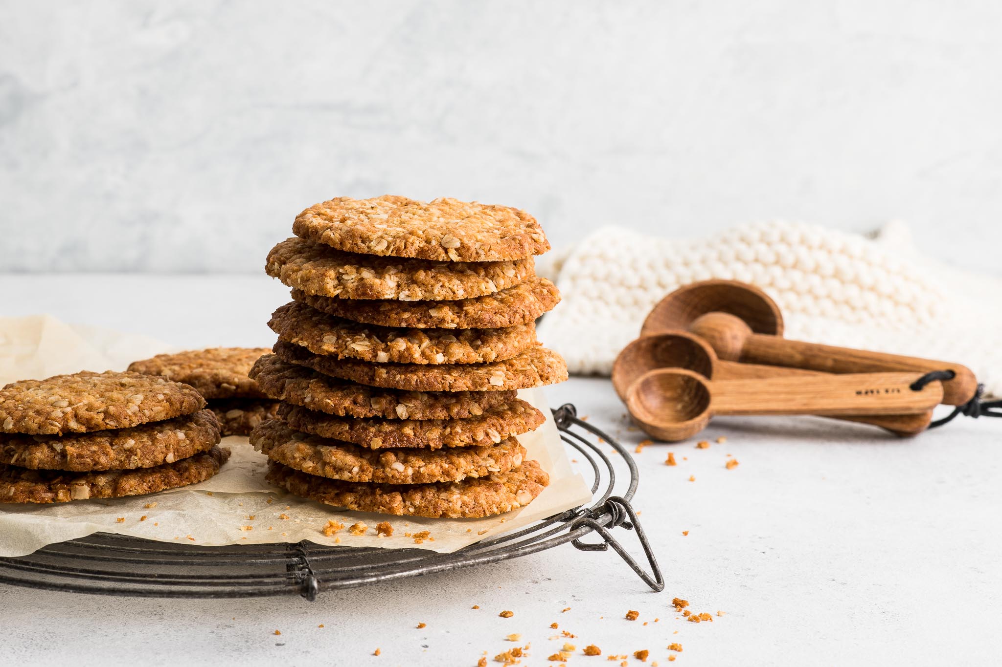 stack of anzac biscuits on metal wire rack