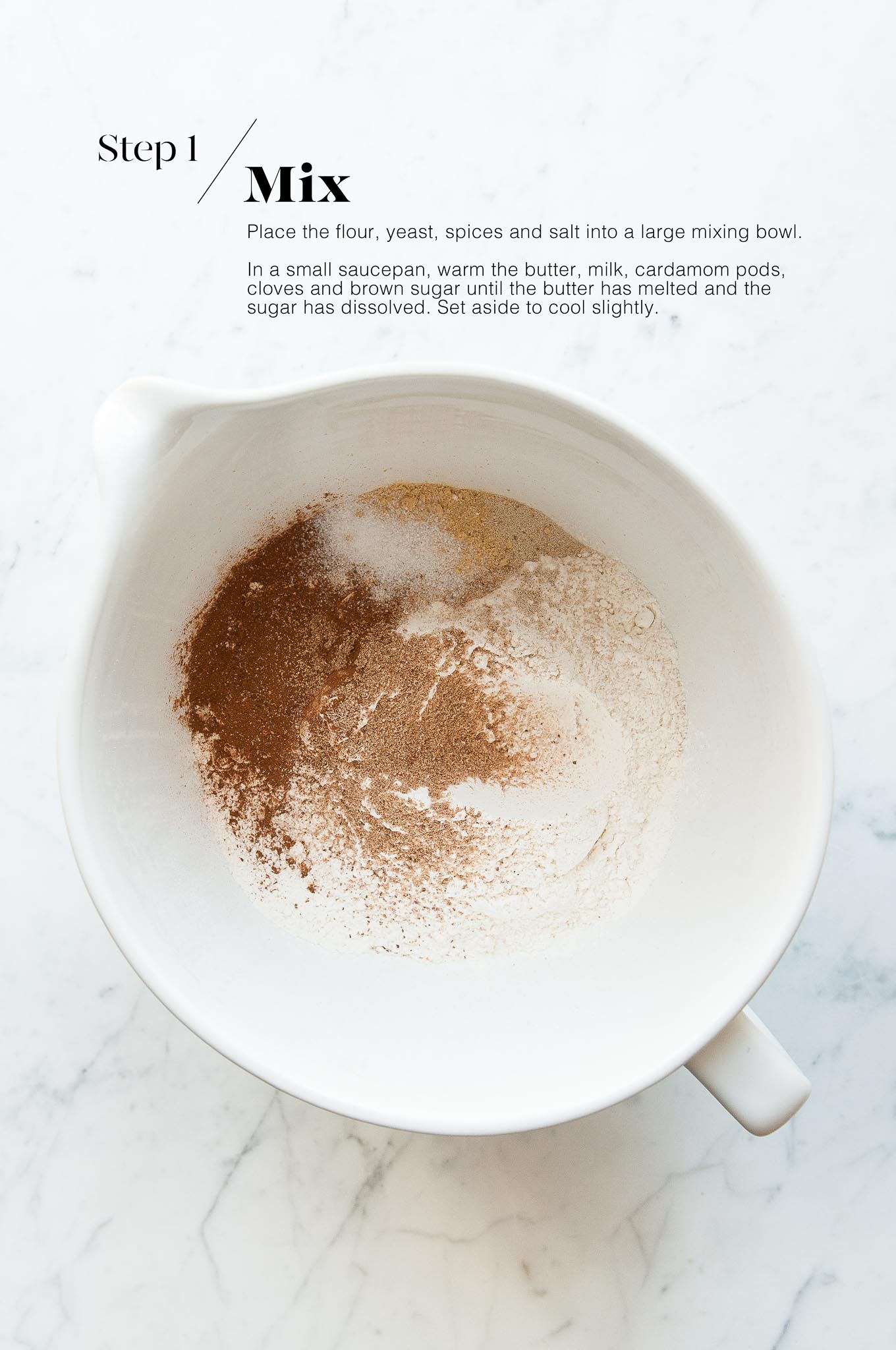 ingredients for hot cross buns in white mixing bowl