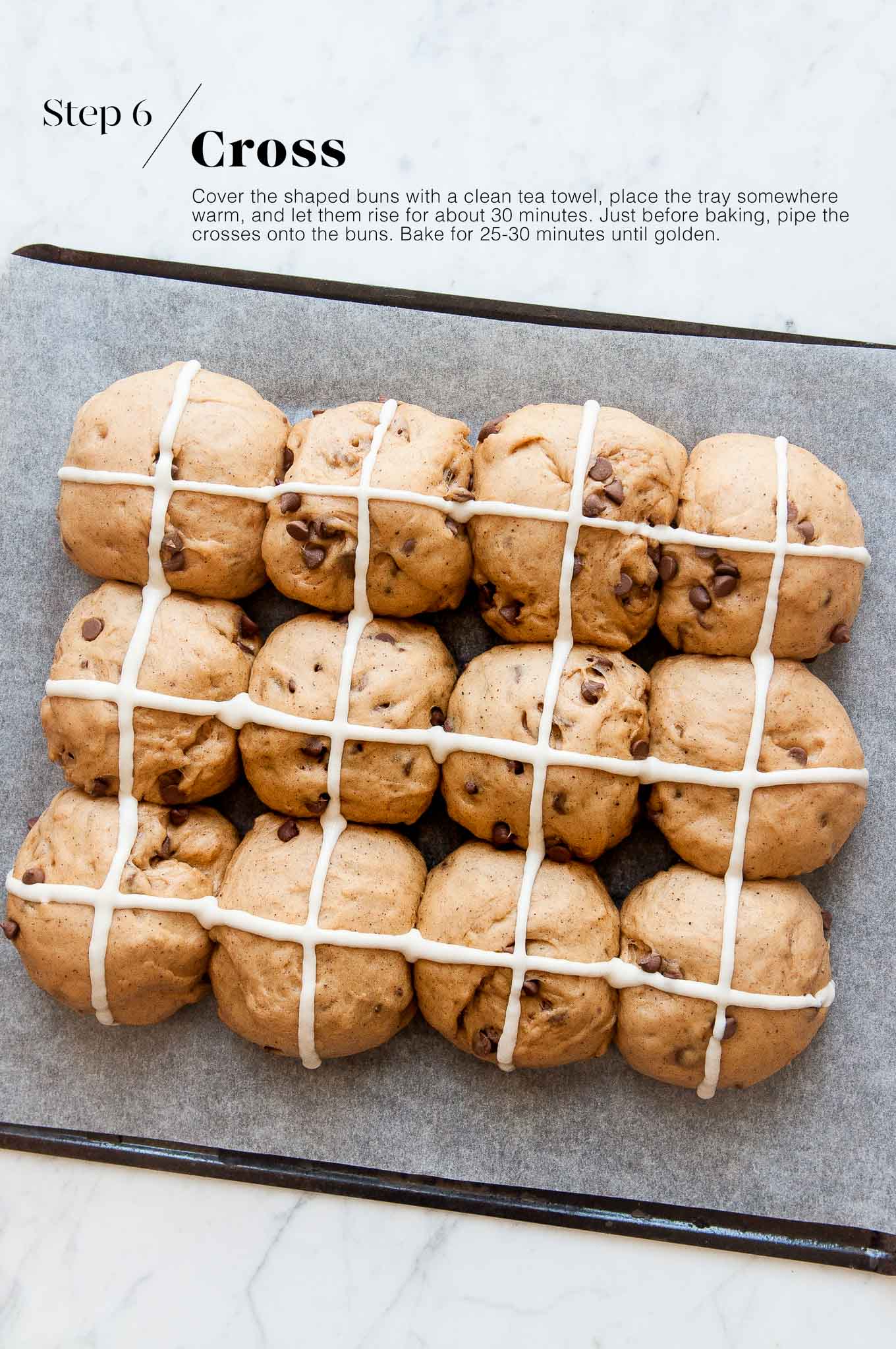 chocolate chip hot cross buns before going into the oven