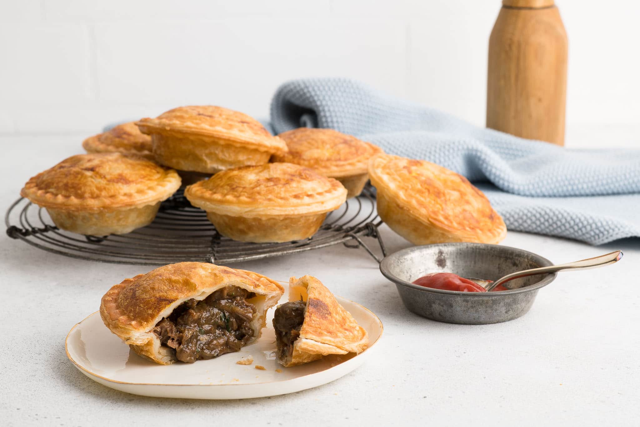 pie maker meat pies on wire rack