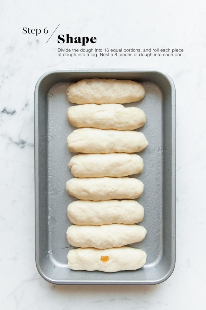 shaped finger buns in baking tray