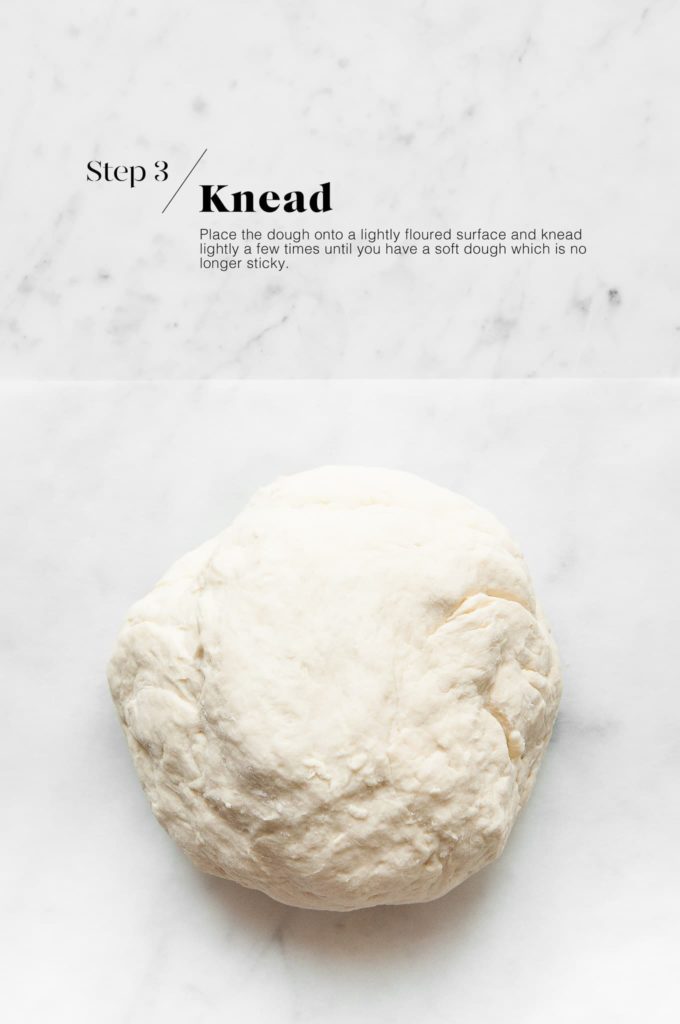 flatbread dough on marble surface