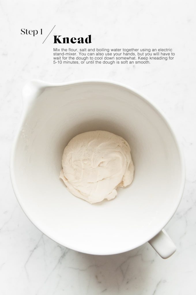 dumpling dough in white mixing bowl
