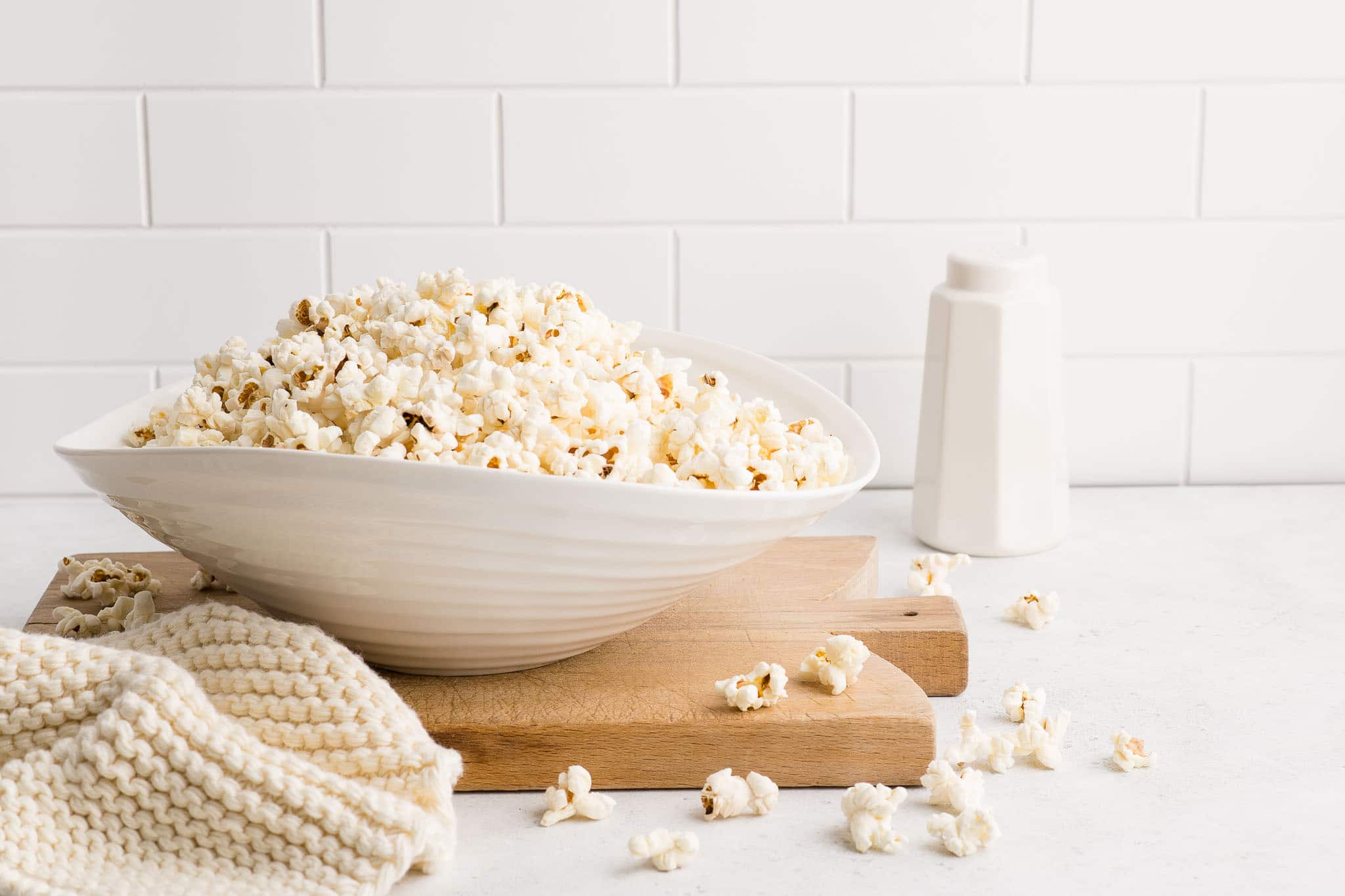 stovetop popcorn in large white serving bowl
