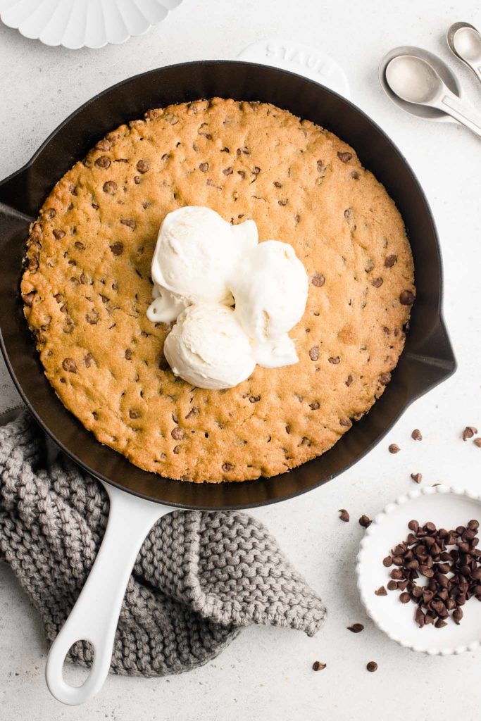 chocolate chip skillet cookie with three scoops of ice-cream
