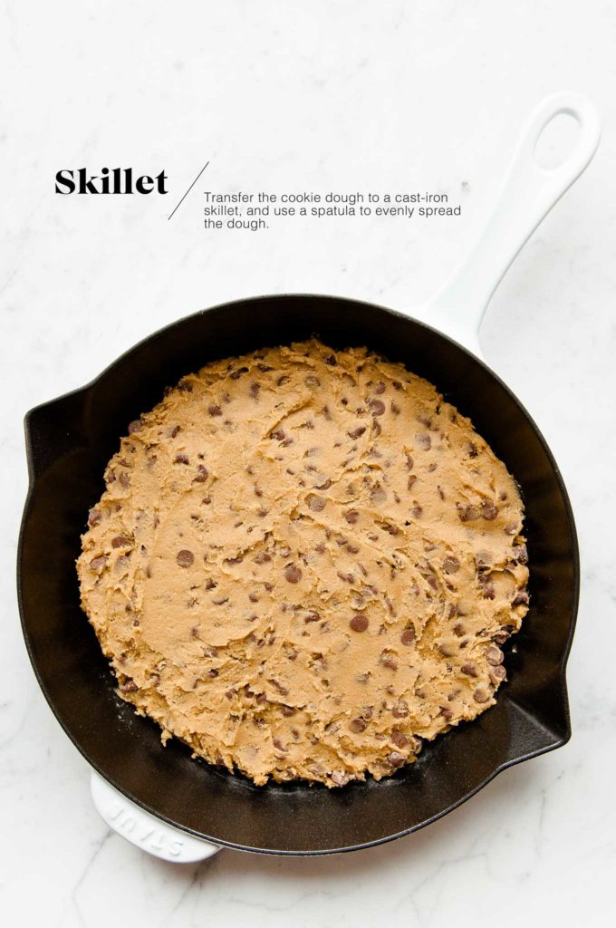raw chocolate chip cookie batter in skillet