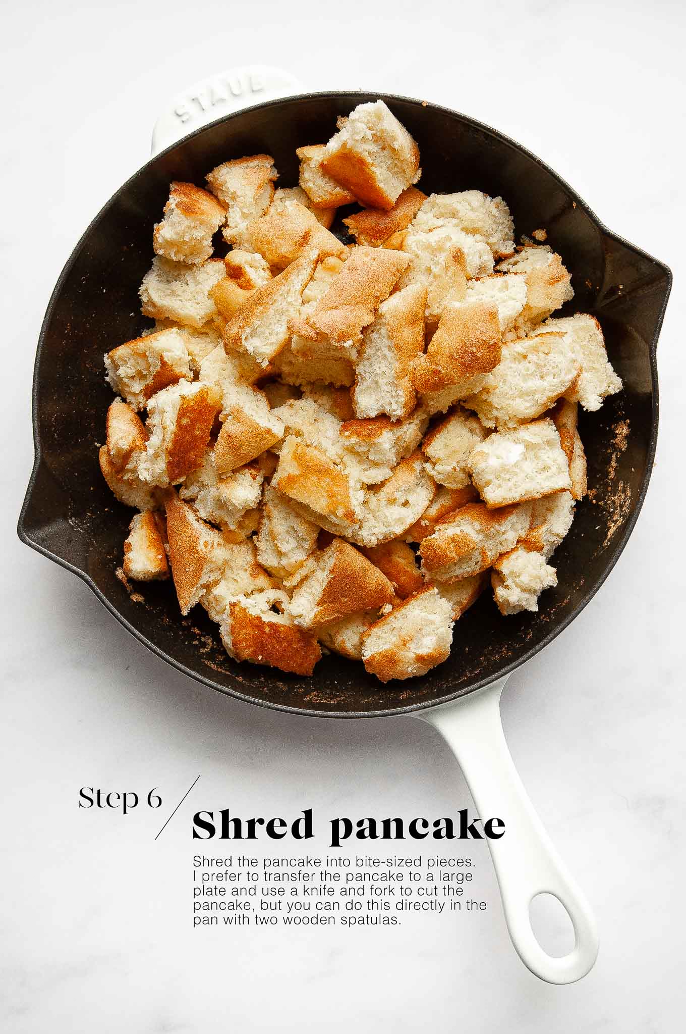 shredded pancake in cast iron pan