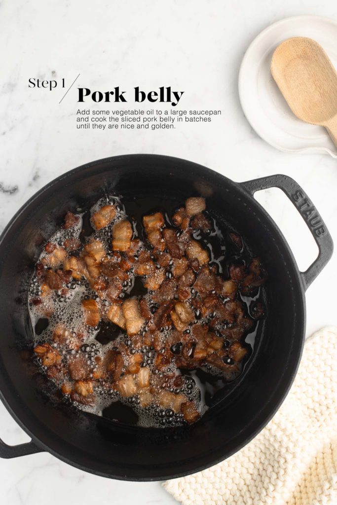 frying pork belly in black cast iron pan