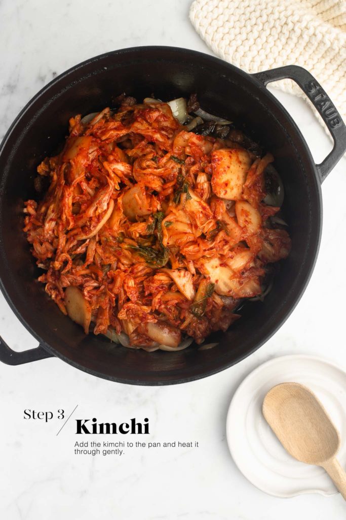 kimchi in black cast iron pan