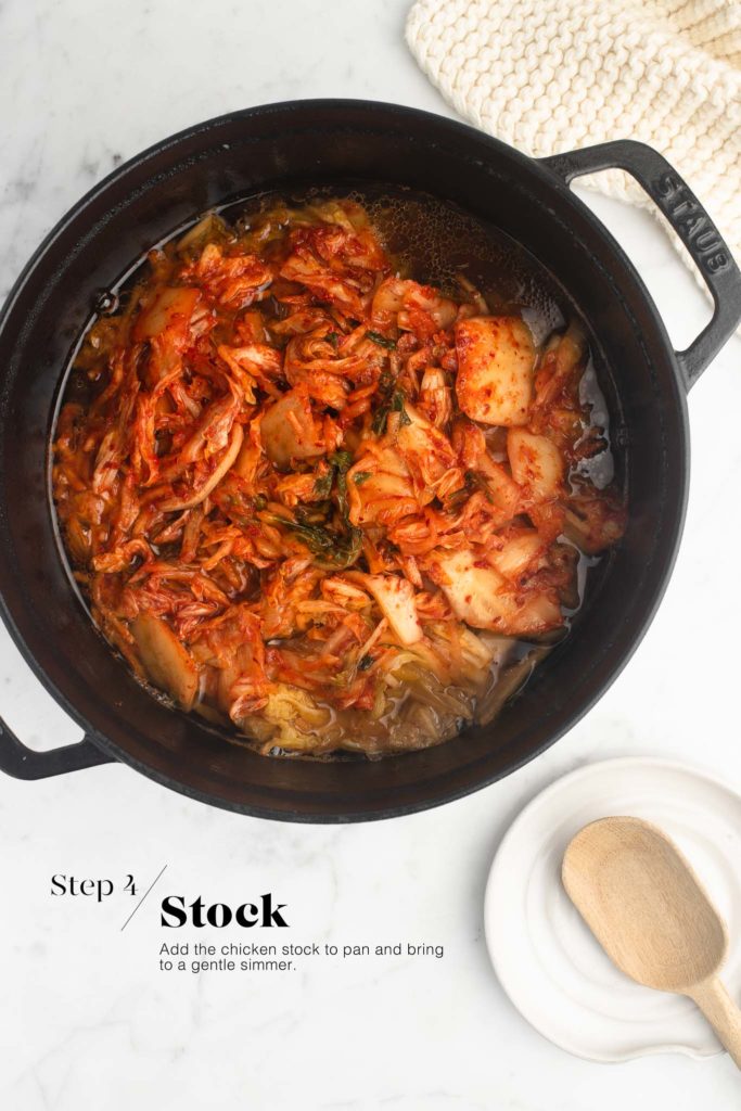 kimchi with stock in cast iron pan