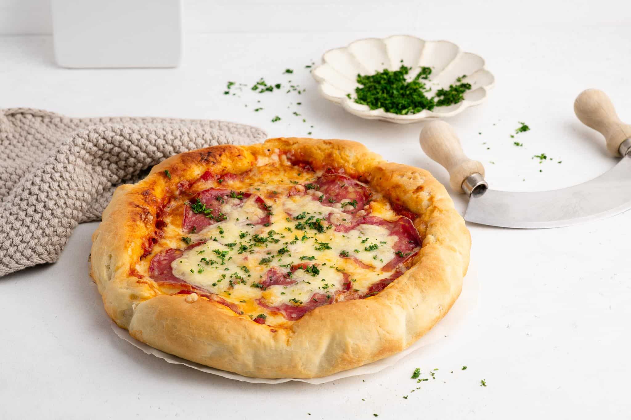 deep dish pizza with salami