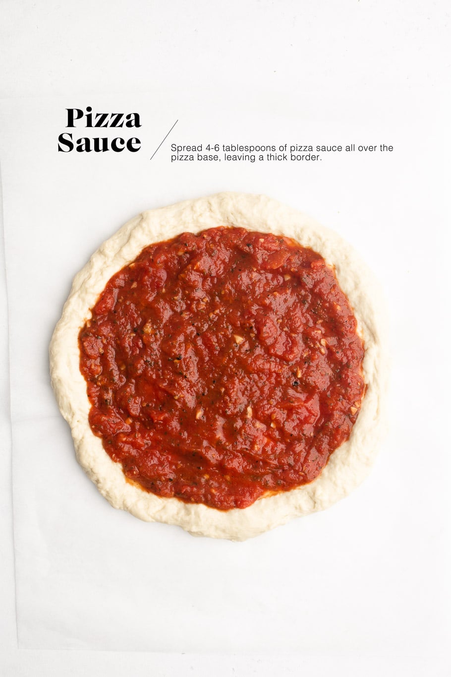 pizza dough with pizza sauce