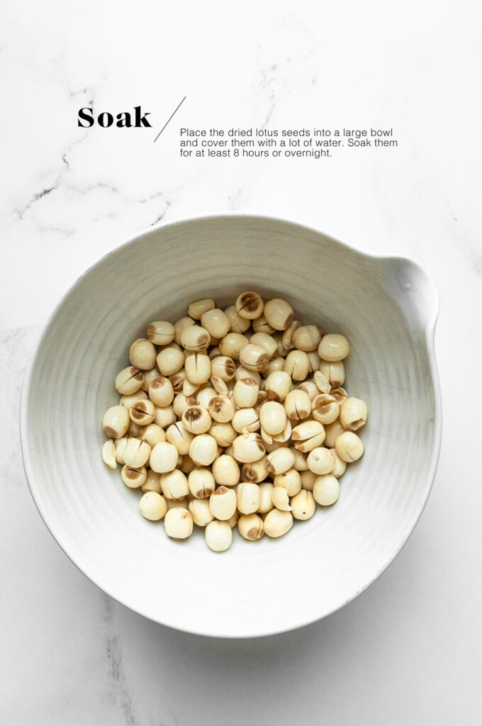 dried lotus seeds in white mixing bowl