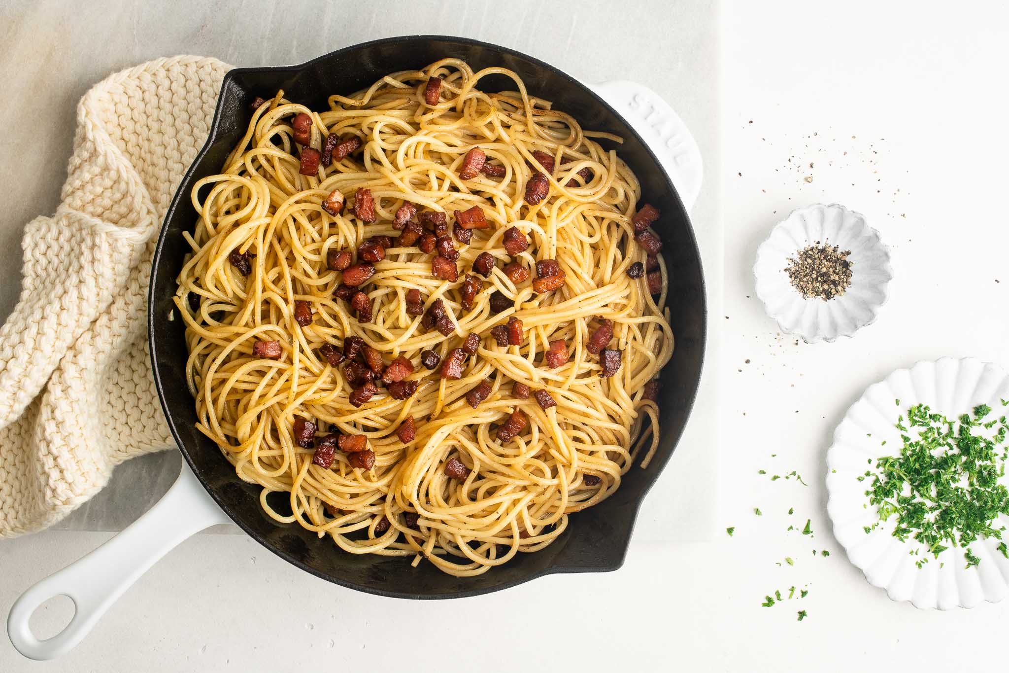 pasta with pancetta in skillet