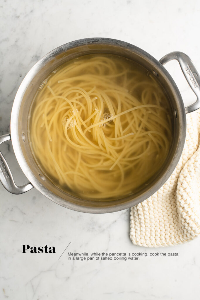 spaghetti cooking in pot