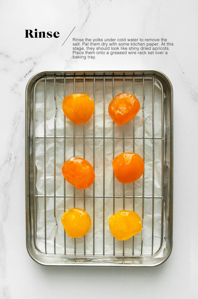 cured egg yolks on wire rack