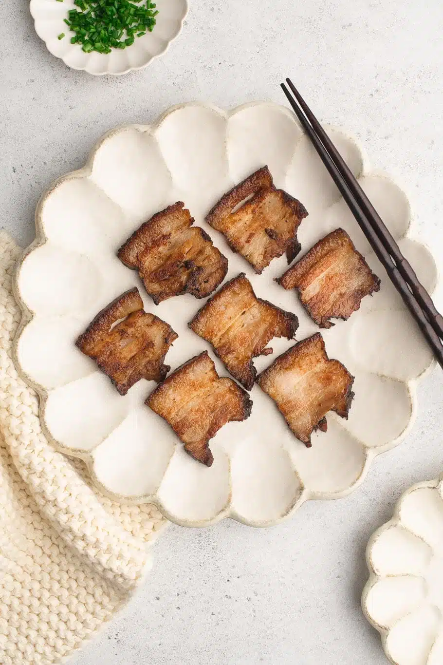 plate with sliced chashu pork