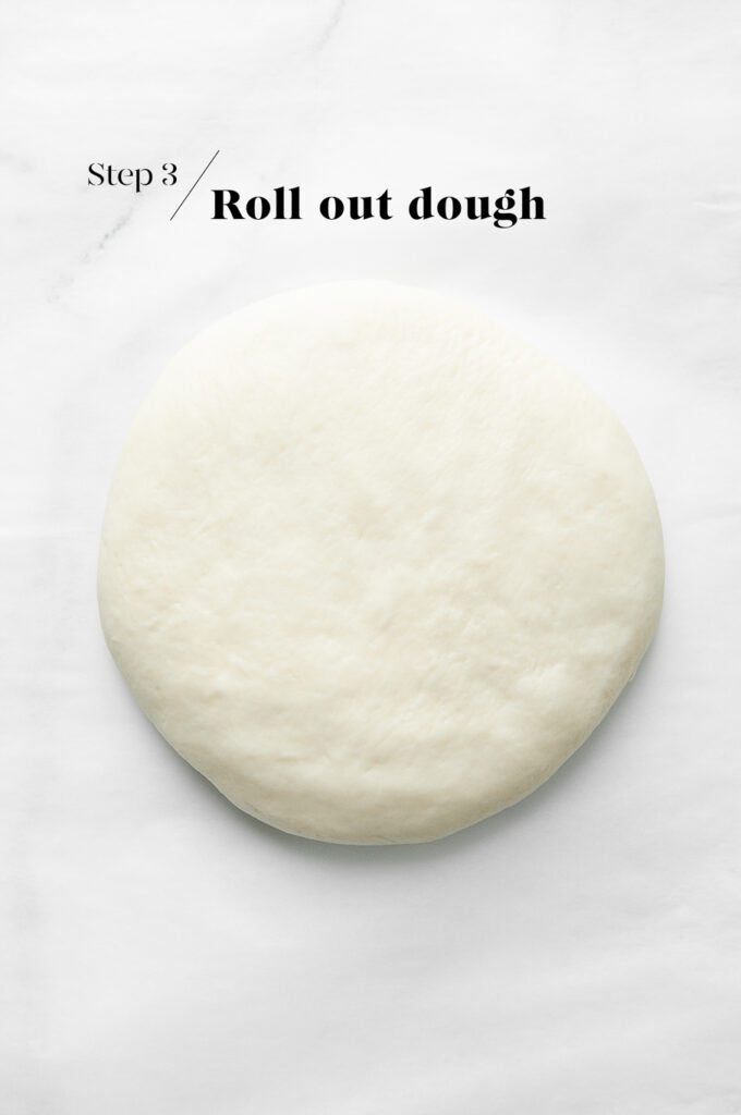 rolling out bao bun dough