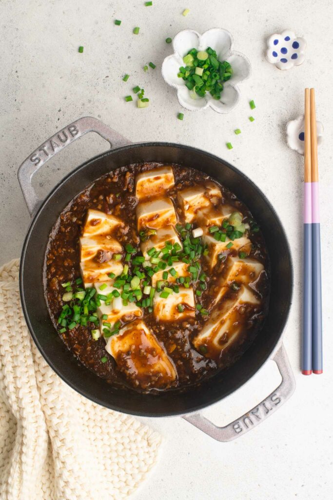 mapo tofu in purple cast iron pan