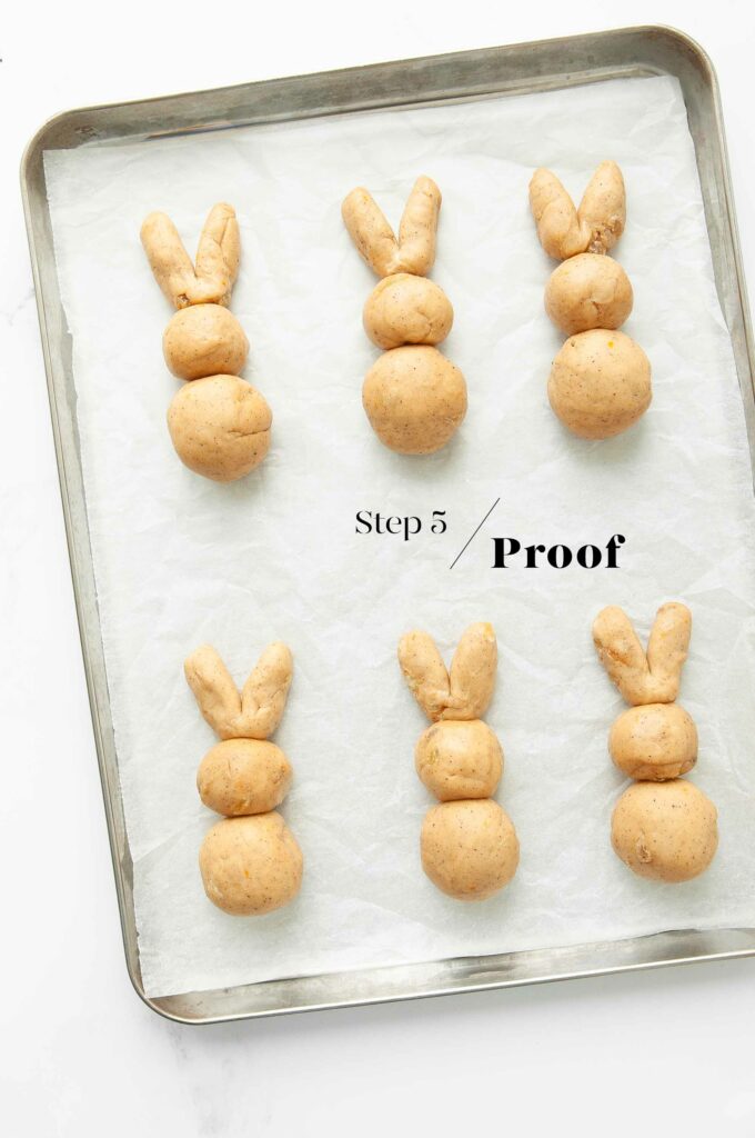 hot cross bunnies on baking try before proofing