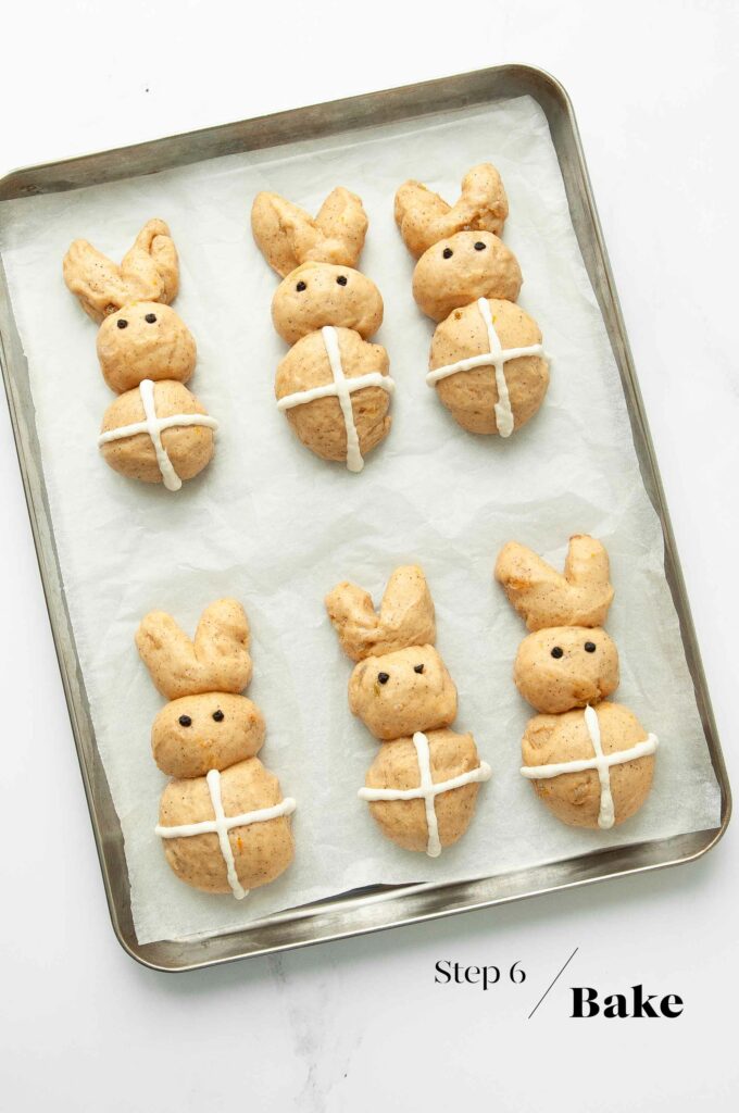 hot cross bunnies on baking tray before baking
