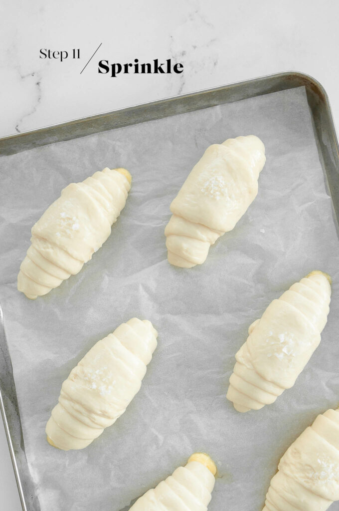 salted butter rolls on baking pan before baking