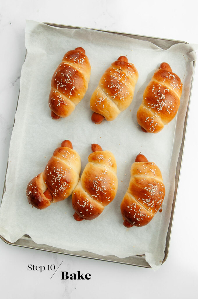 baked chinese hot dog buns on baking tray