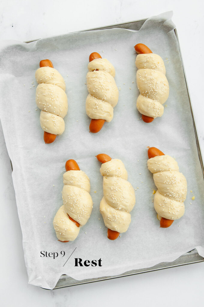 chinese hot dog buns on baking tray before going into oven