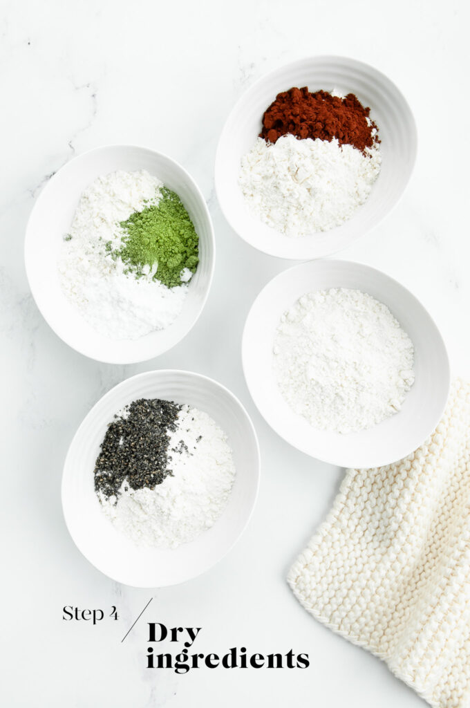 dry ingredients for sable cookies in white bowls