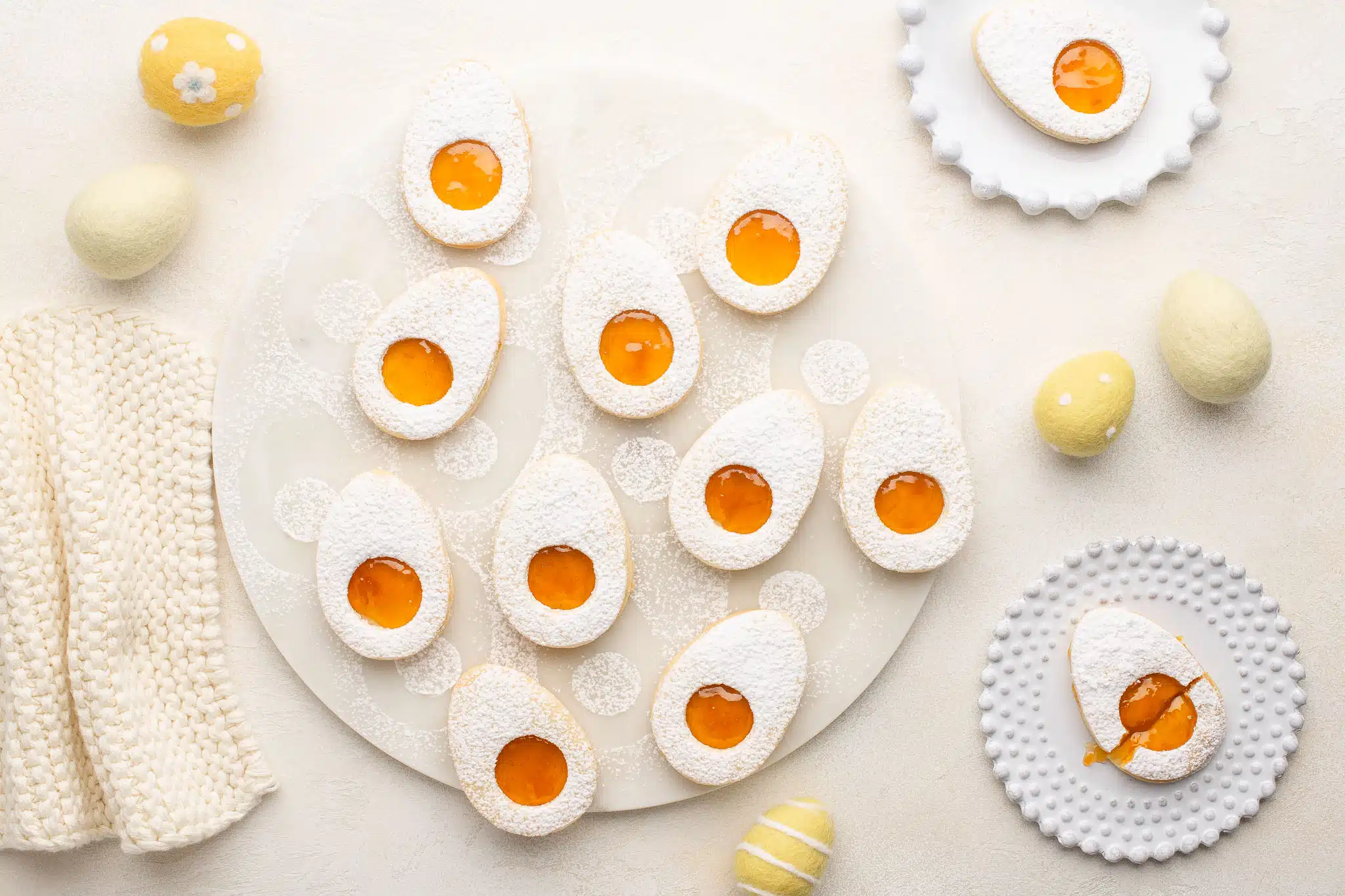 easter linzer cookies on marble plate